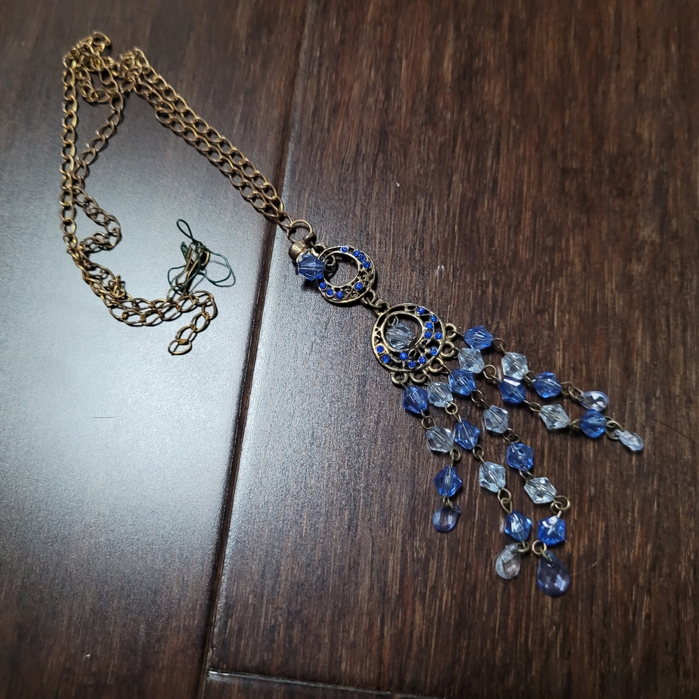Blue and Gold Cascading Necklace with Vintage Design